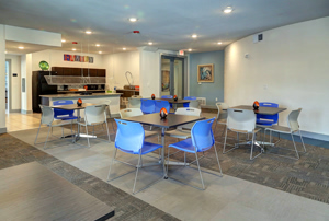 Photo of Tables and Chairs within the Common Area at Martha's Vineyard Place Apartments