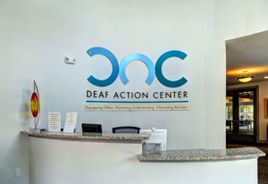 Photo of Reception area with Deaf Action Center signage in the background